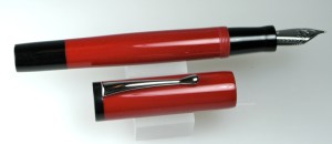 Chronicler in Lucky Red Italian acrylic and Black Ebonite