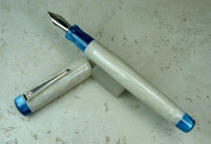 Exemplar in Iridescent Opal Flake Alumilite & Madreperlato Turchese Acrylic