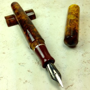 Idyll in Illuminated Amber Tortoise & Urushi Red Acrylic with Sterling Silver Band – Medium