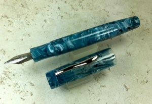 Custom Balladeer in Teal Tempest, straighter cap , Large