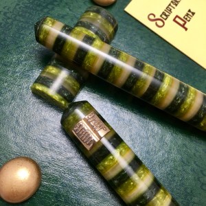 Idyll in Evergreen Acrylic with Bronze Open Book Roll Stop - Small, Elongated