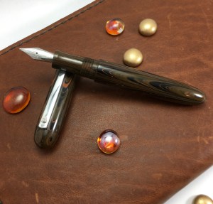 Zephyr in Orange Ripple Nikko Ebonite - Medium