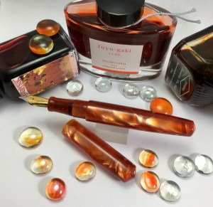 Idyll in Dark Orange Swirl Lucite - Medium