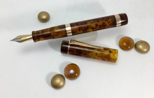 Custom Marlborough Style in Illuminated Amber Tortoise with Bronze furnishings - Medium