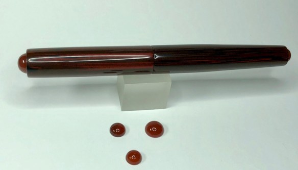 Illuminaire in NYH Cumberland Ebonite with Carnelian Cabochons - Small