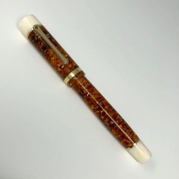 Churchillized Epic in Conway Stewart Amber & Ivory Swirl - Medium